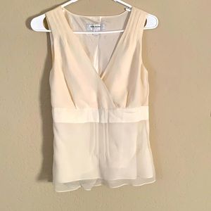 Sleeveless blouse with silky liner